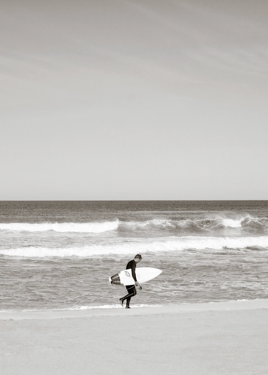 Surfer walking