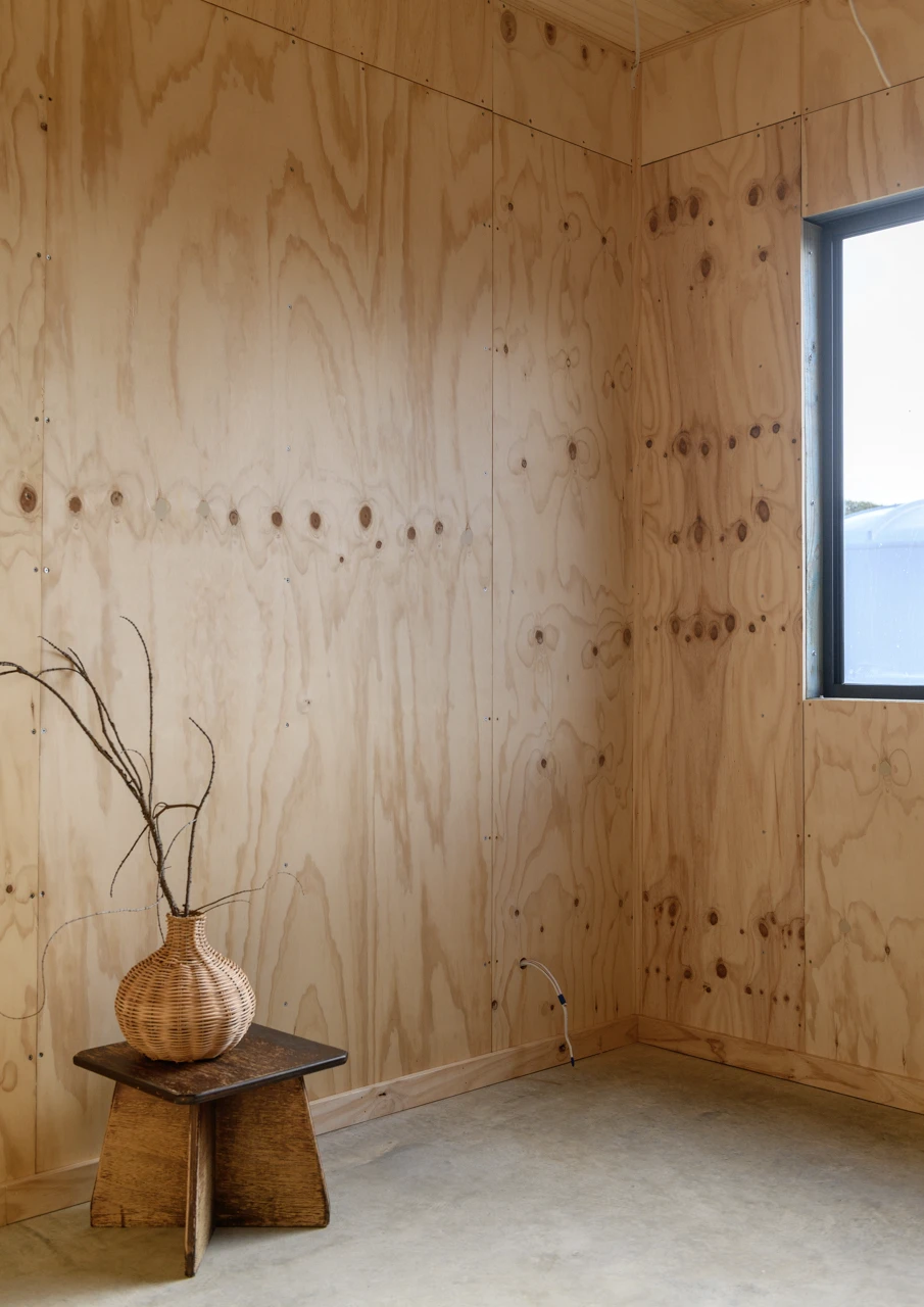 Empty room with wooden walls