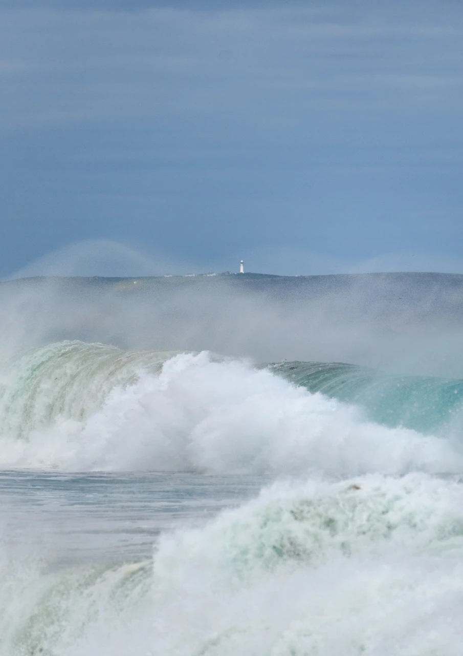 Big waves and distant lighthouse