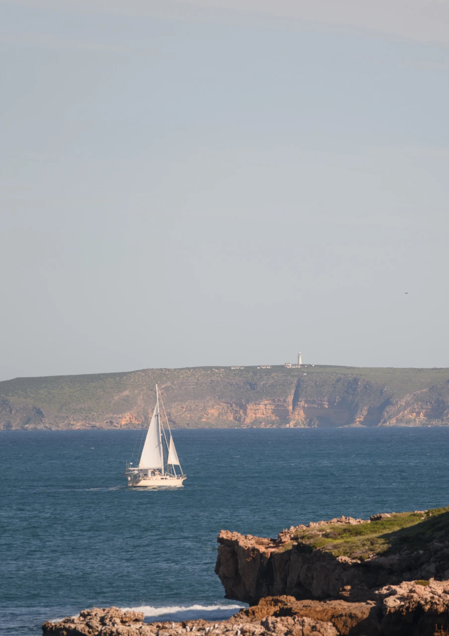 Yacht and lighthouse
