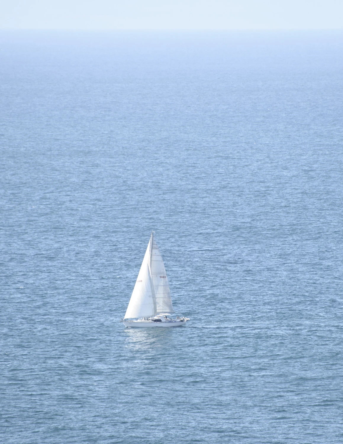 Yacht sailing by