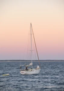 Pink sunset and a yacht