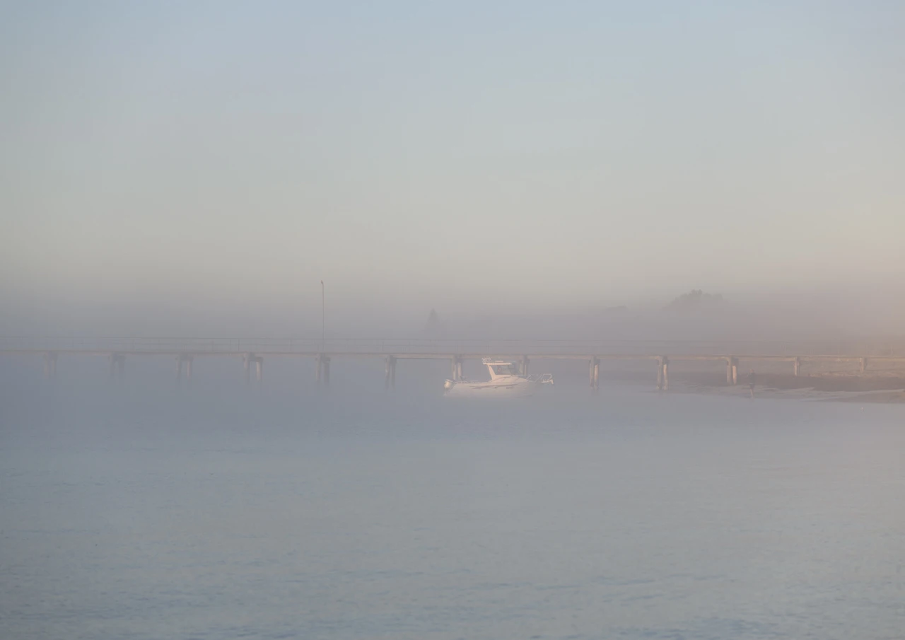 Fishing boat in the fog Fishing boat in the fog