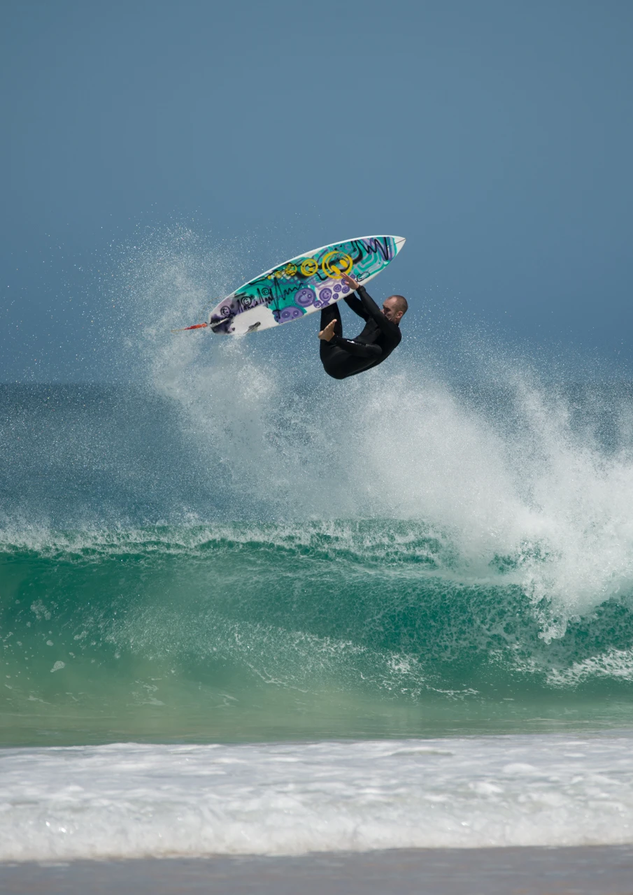 Surfer and jet ski