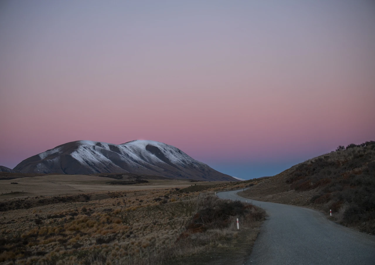 Road into the snowy mountains New Zealand