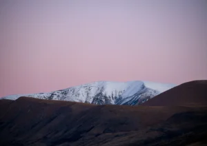 Pink sky over the snowy alps