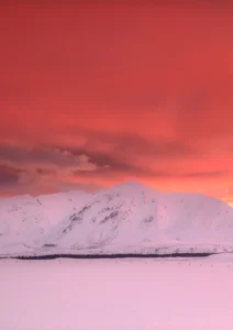 Cold night with red fire sky as the sun sets.