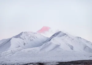 Pink cloud hovers over Mt Potts New Zealand