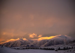 Shadows made by the light falling over some snowy hills
