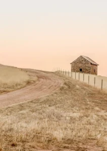 Old stone house at the end of a drive