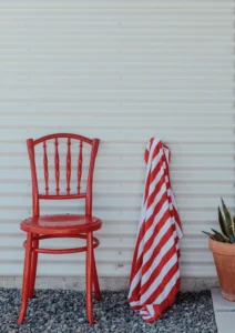 Red chair outside the beach house