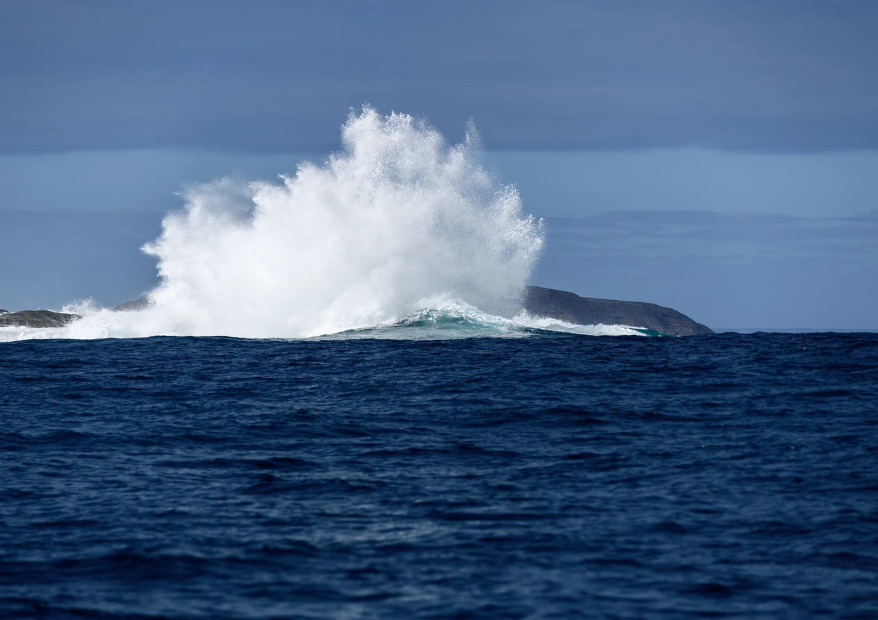 Eames reef and deep blue sea Eames reef and wave crashes on the reef
