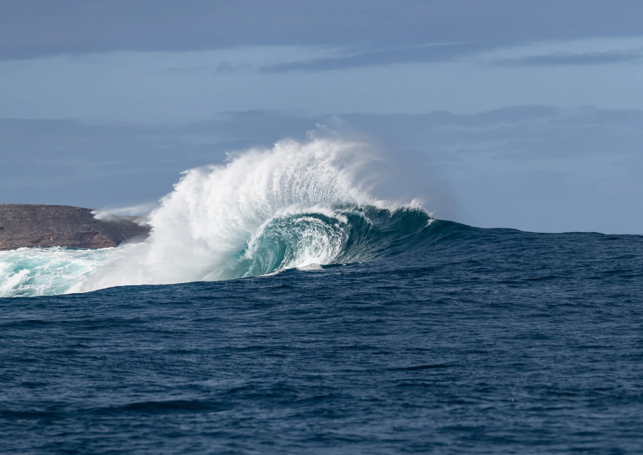 Flurry of white water at Eames reef Eames reef and wave breaking