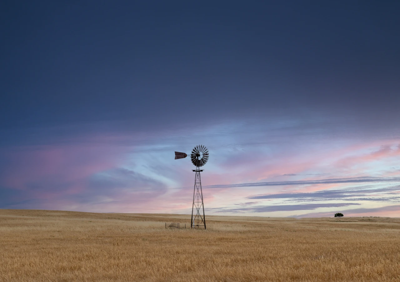 Old windmill and new blue sky
