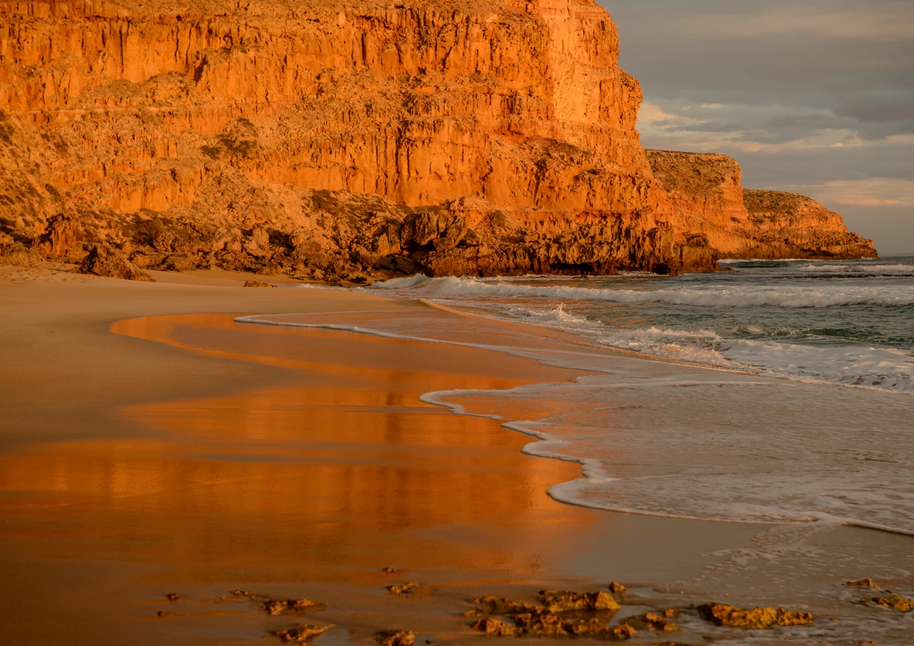 Ethels beach orange cliffs at sunset