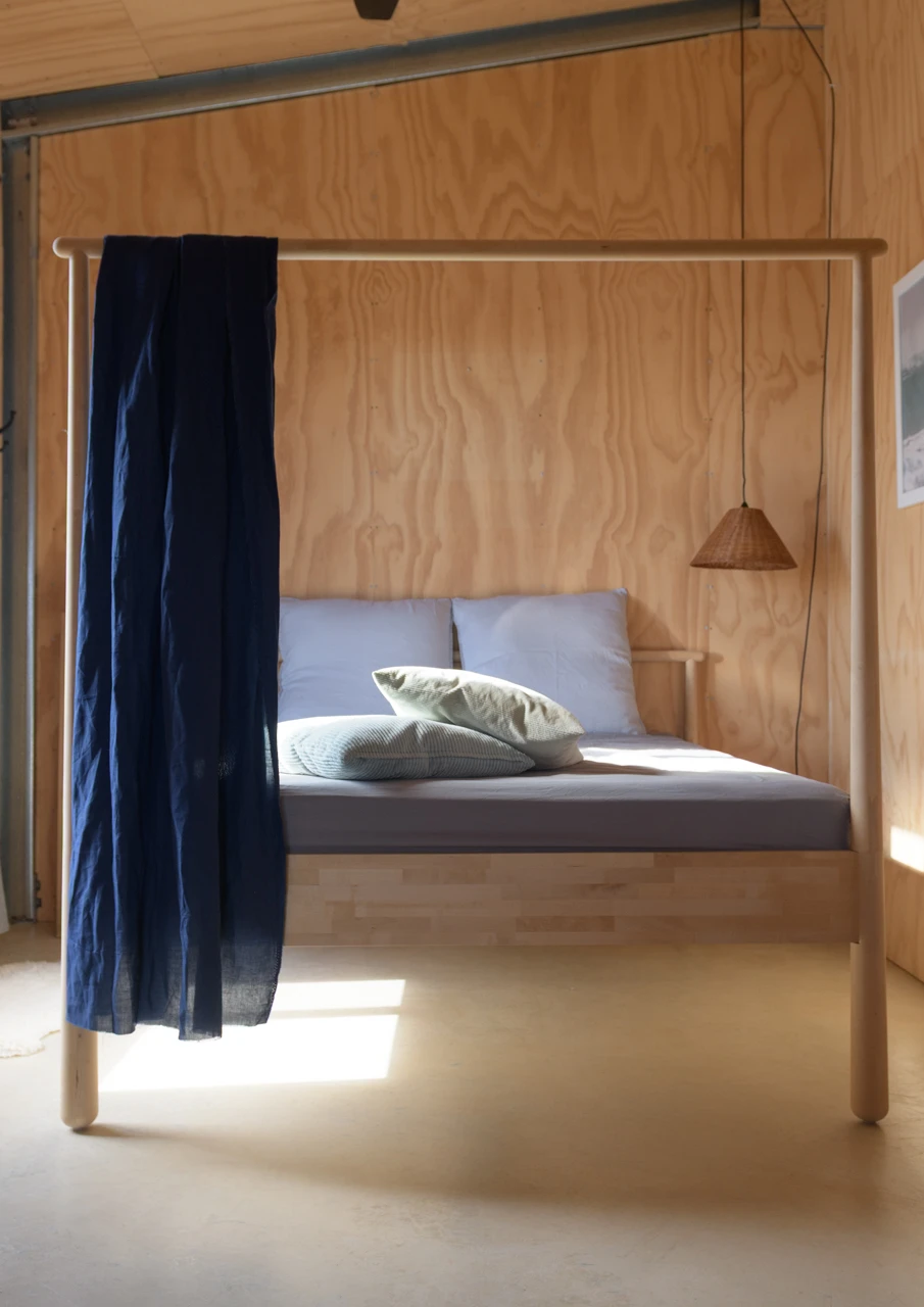 Bed in guest house interiors