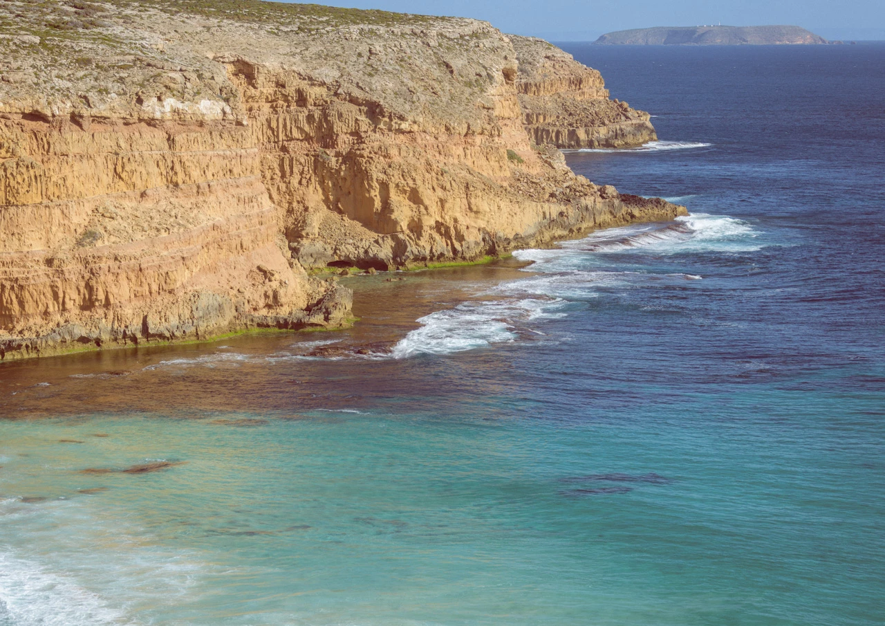 Ethels cliffs and blue turquoise ocean Ethels cliffs at the beach vintage look