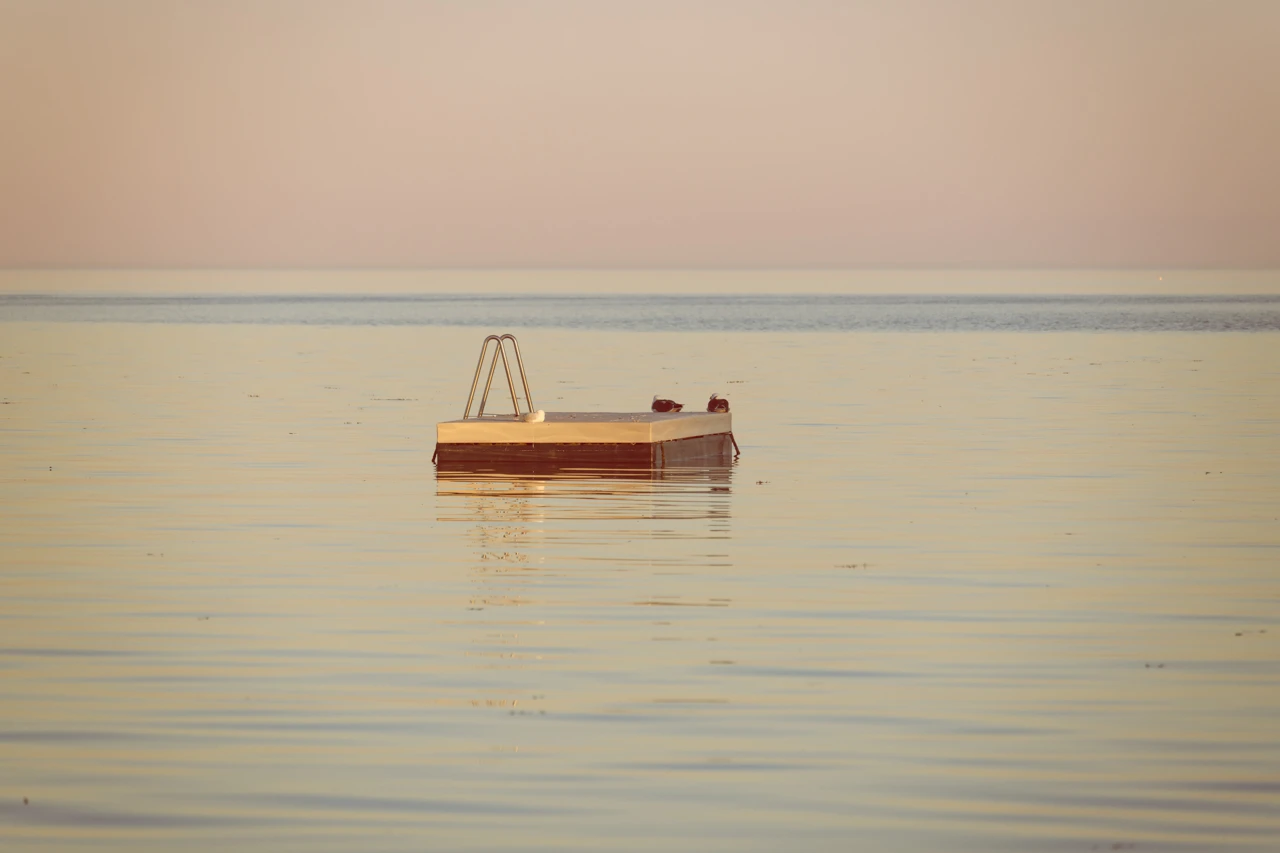Port Clinton swimming pad at sunset Port Clinton diving pad in the center of the bay