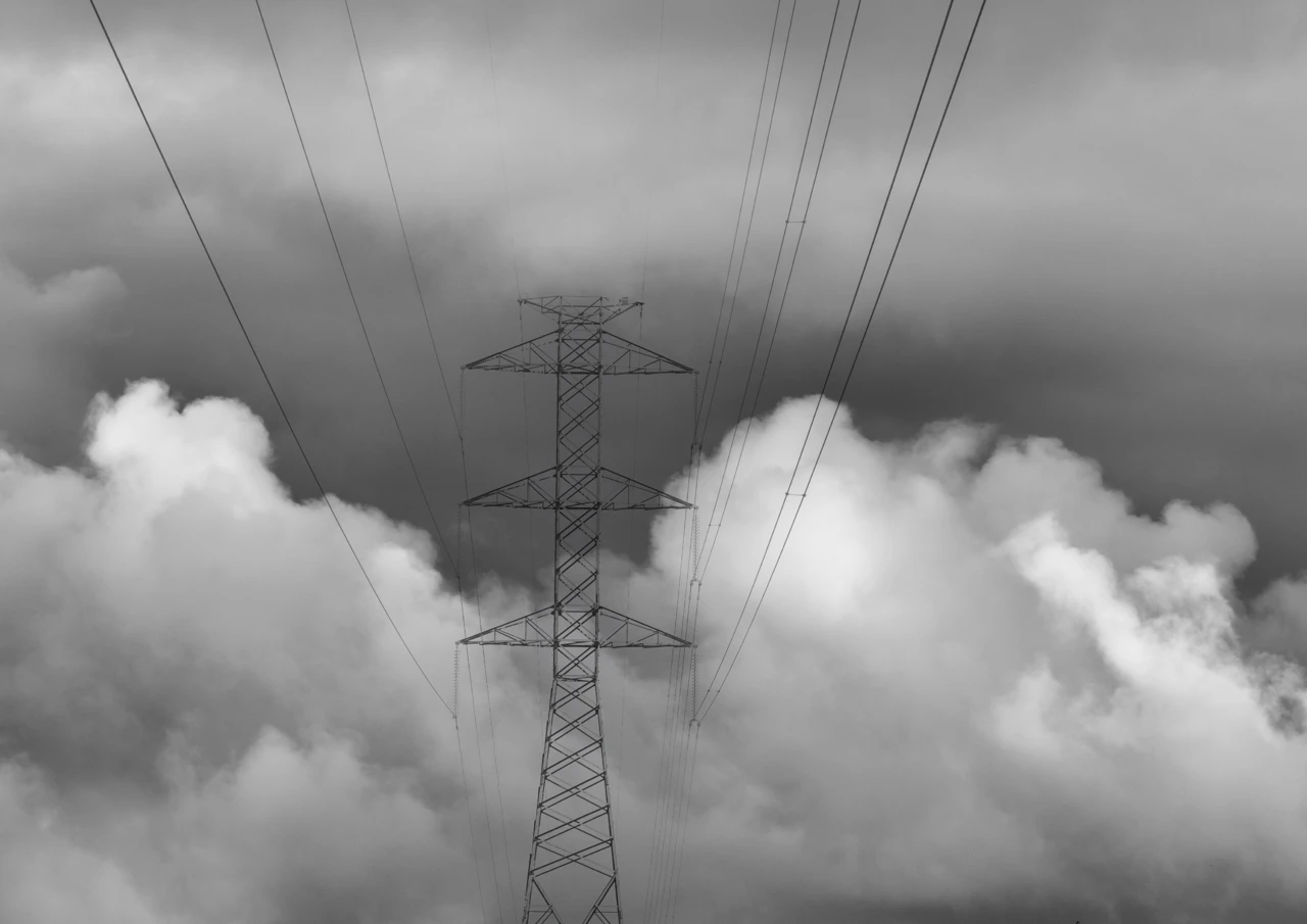 Power lines in the clouds black and white Power lines in the clouds black and white