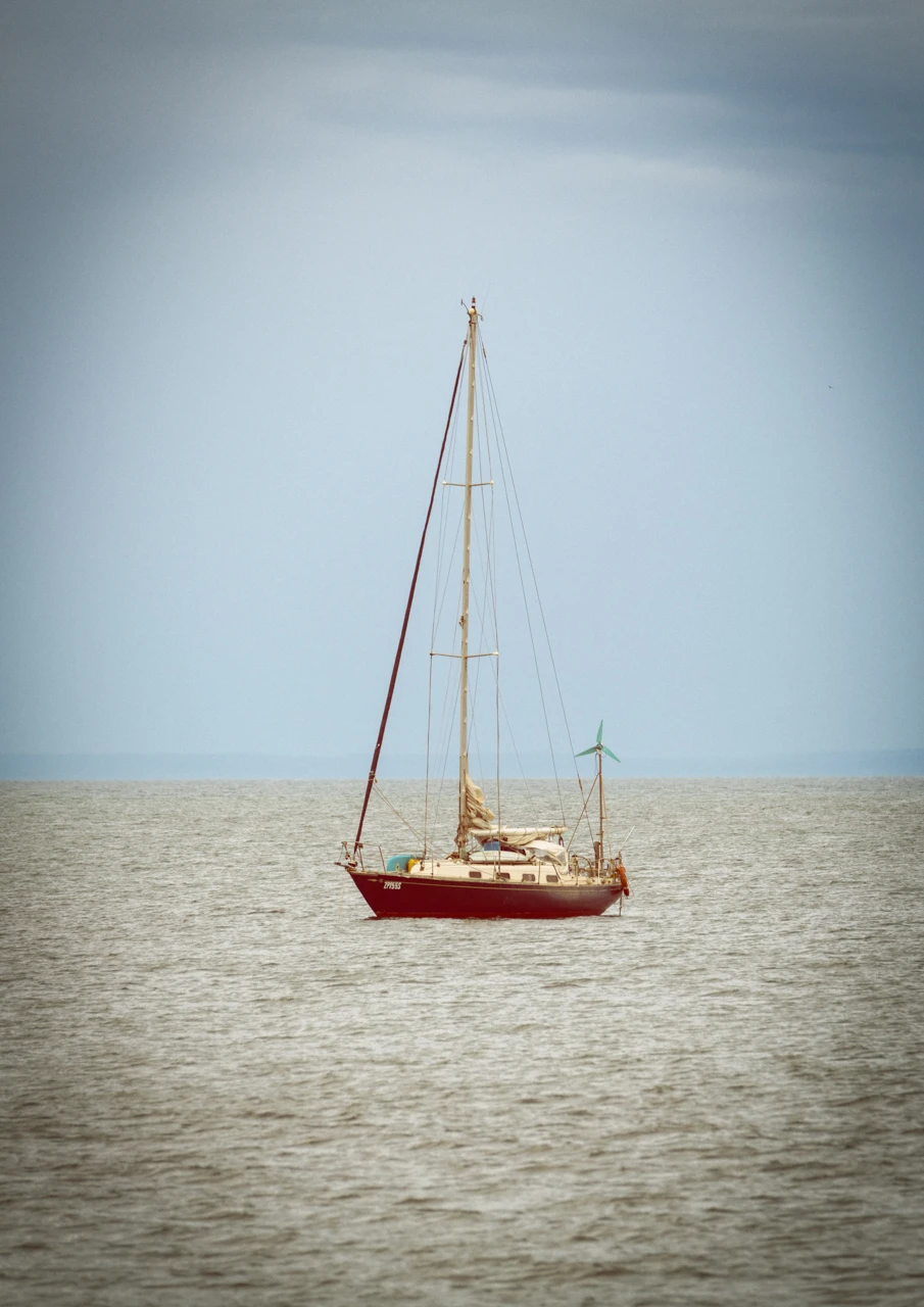 Vintage yacht moored at sea Yacht moored at the beach side