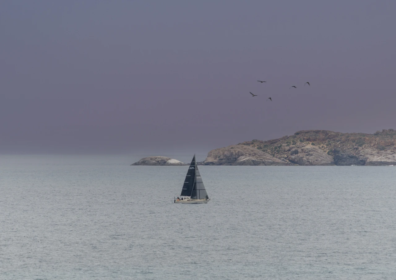 Yacht sails past Seal Island Yorke Peninsula Yacht sails past Seal Island Yorke Peninsula