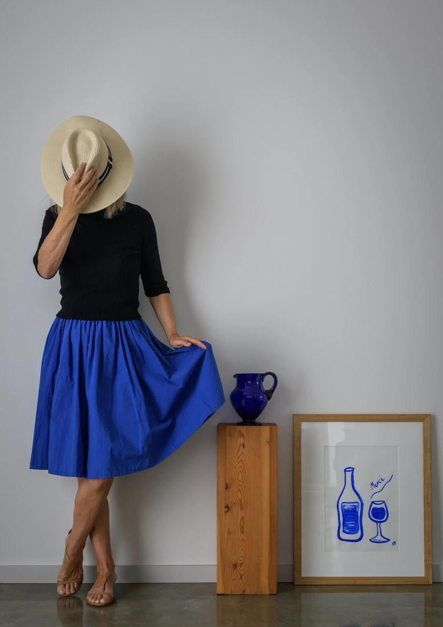 Wendy Philip blue skirt Wendy Philip in blue skirt and sun hat