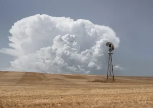 Windmill with thunder clouds coming