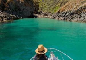 Into Salmon Inlet girl with sunhat on a boat