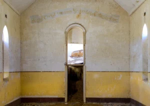 Old abandoned church with writing on the wall