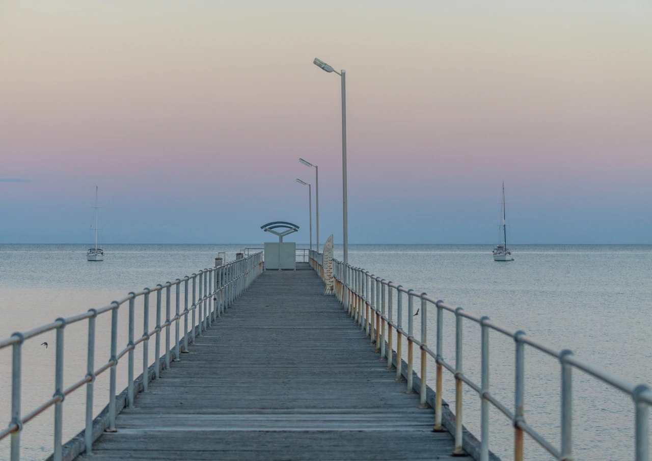 Marion Bay jetty with two yachts in the distance