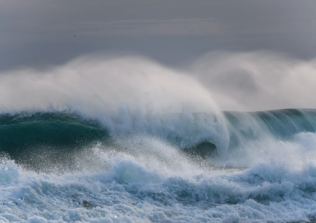 Wave and wind blowing seaspray Howling winds and big waves West Cape beach Yorke Peninsula