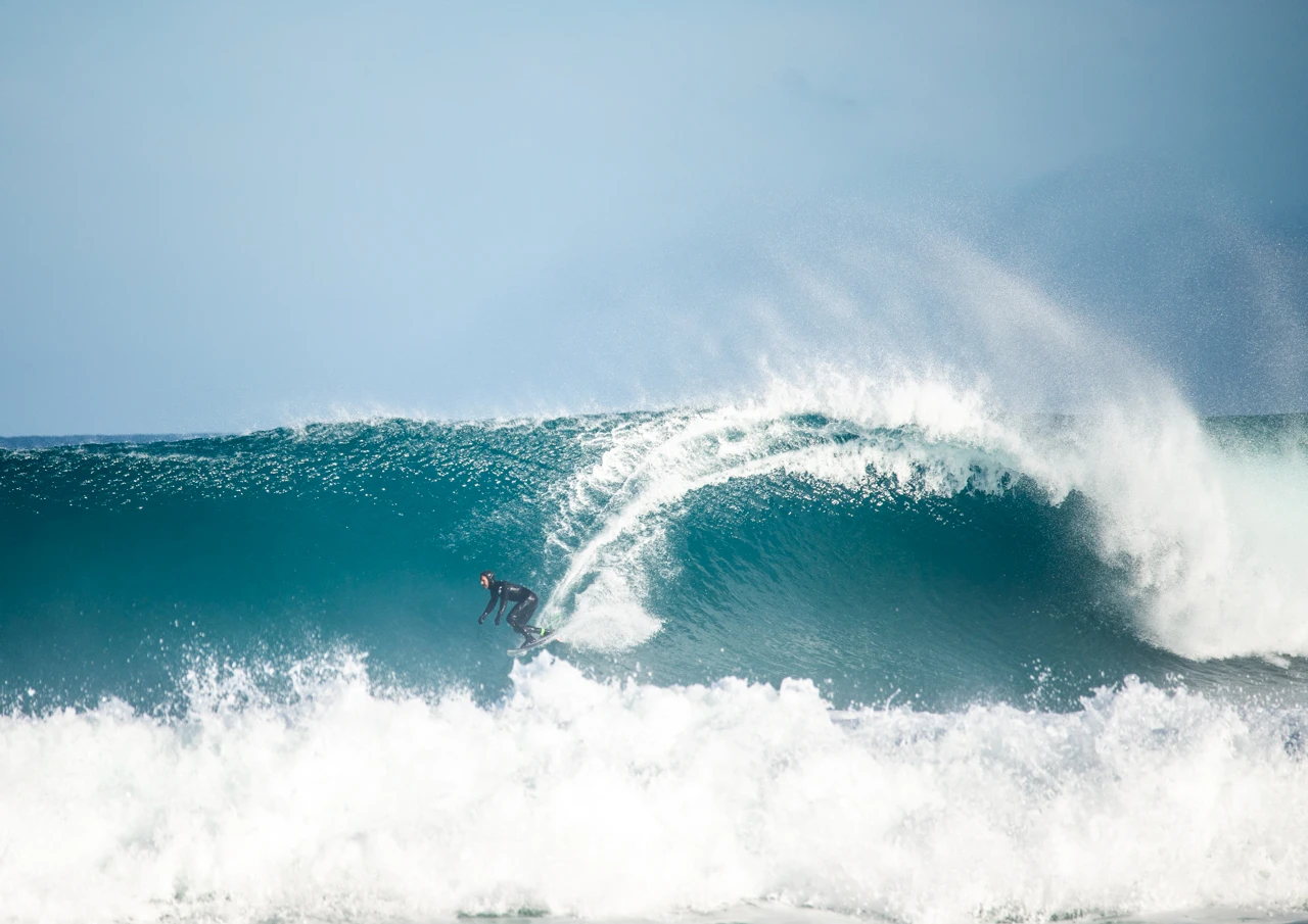 Waves and a surfer West cape Yorke Peninsula Waves and surfer West Cape Yorke Peninsula