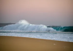 Beautiful wave at sunset West Cape beach Yorke Peninsula