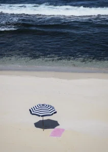Blue ocean and a pink towel, Chinamans Beach yorek Peninsula