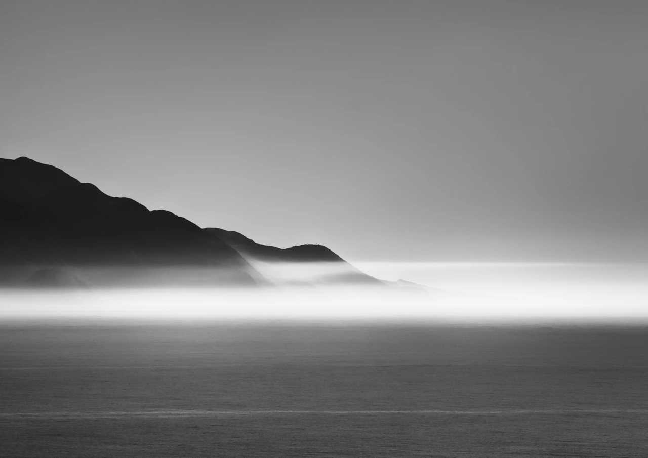 Distant morning mist over the ocean Kaikoura New zealand