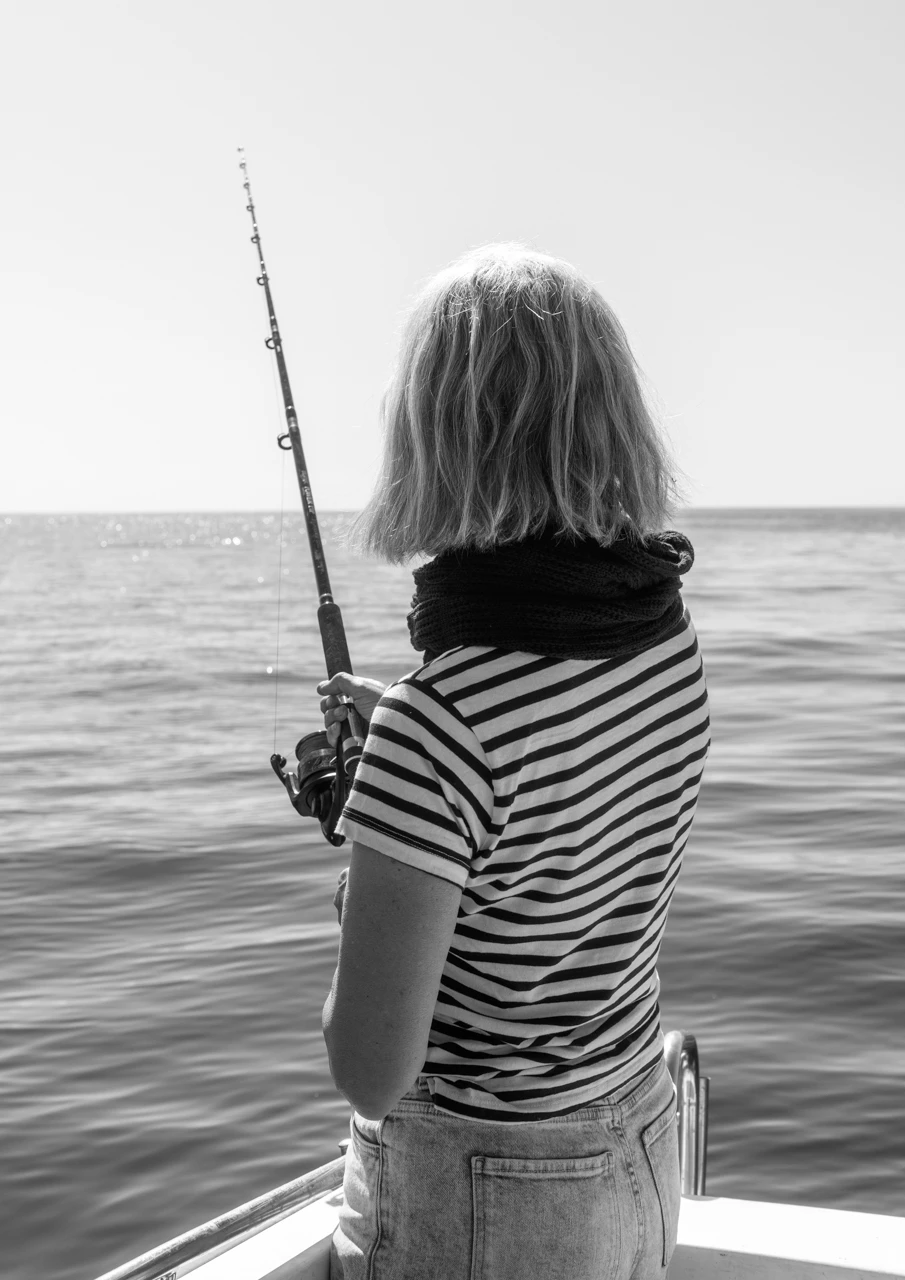 Fishing out at sea on a calm day.