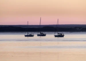 Three yachts moored at Marion Bay