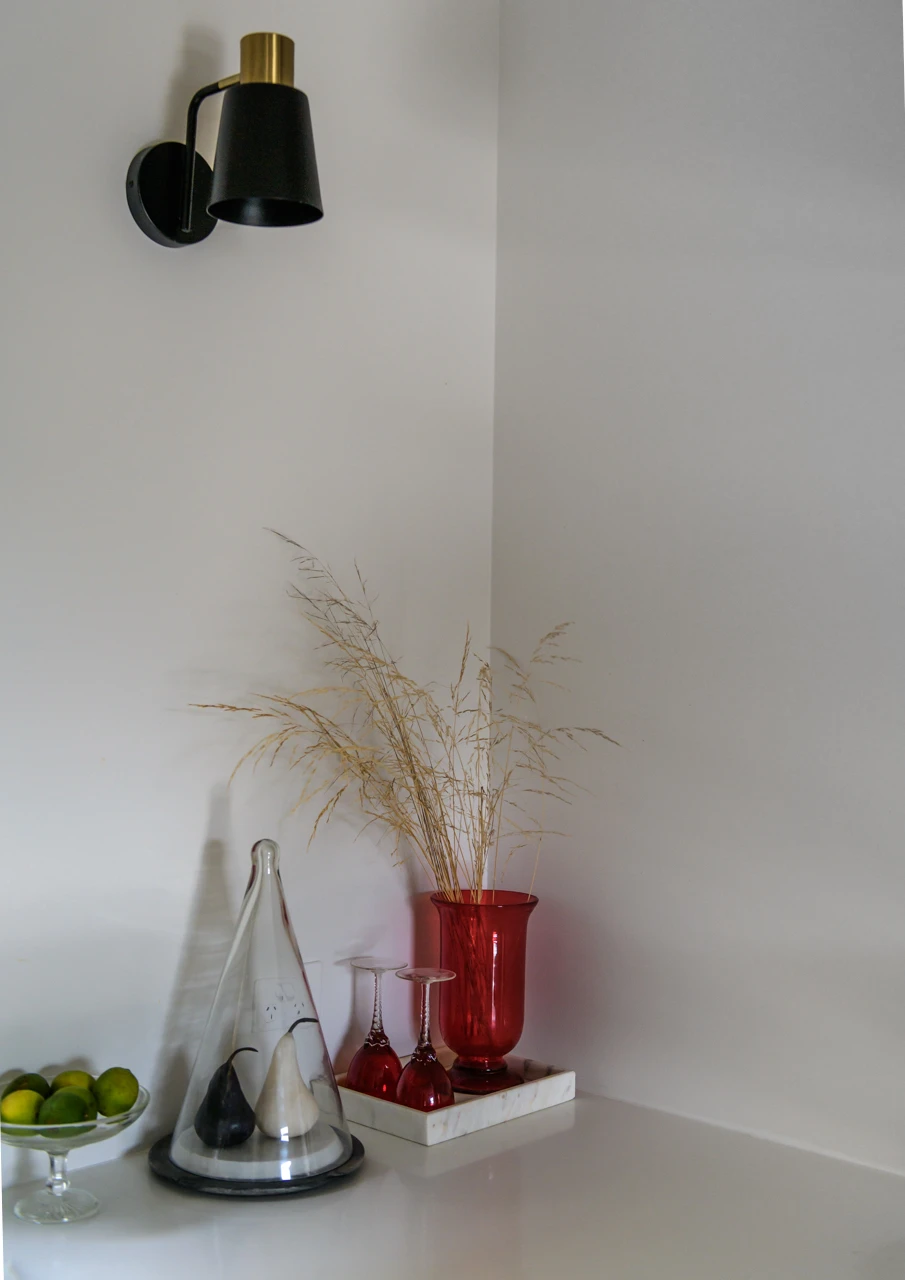Kitchen with red vase and calosh