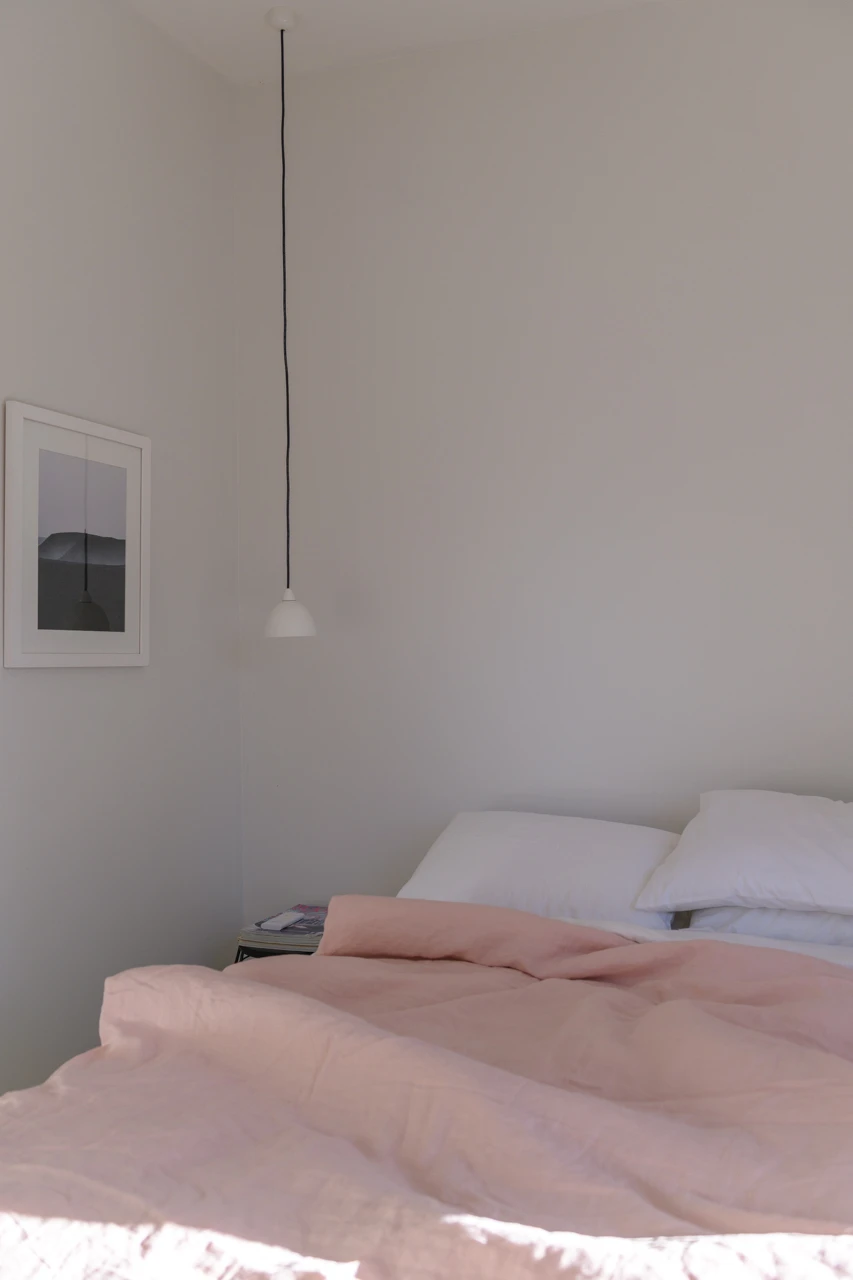 Pink bedroom and hanging light